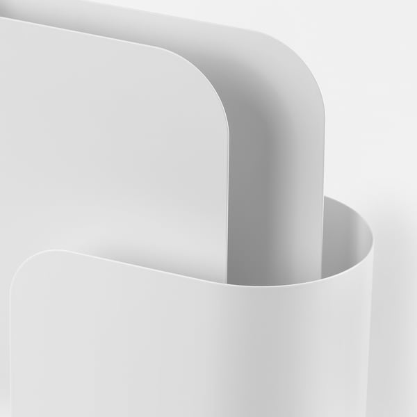 White metal magazine holder with multiple slots.