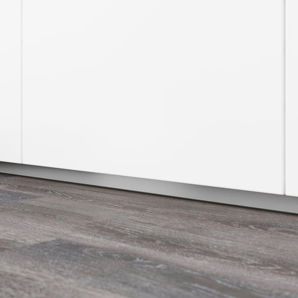 White kitchen cabinet plinth, part of FÖRBÄTTRA series, neatly covering the gap between floor and cabinet for clean finish.