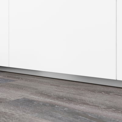 White kitchen cabinet plinth, part of FÖRBÄTTRA series, neatly covering the gap between floor and cabinet for clean finish.
