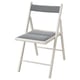 White folding chair: FRÖSVI; comfortable, eco-friendly, space-saving design.