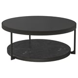 Black round coffee table with smoked glass top and lower marble shelf, sleek metal legs.