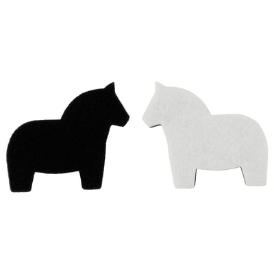 Two HÄSTHAGE sponges, black and white, shaped like a horse, in contrasting colours, made of pet and polyurethane foam.