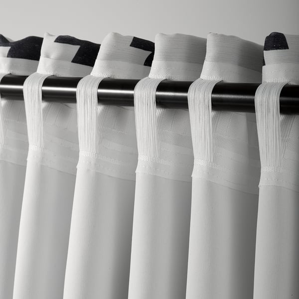 Blackout curtains with hooks for easy pleats.