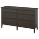 An IDANÄS dark brown wide dresser with six drawers, featuring a sleek design and traditional details.