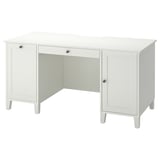 A white IDANÄS desk with cabinet storage, designed for home offices. It a smooth surface, soft-closing drawers, and a timeless, functional design.