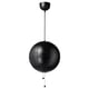 The IKEA PS 2014 black pendant lamp a spherical design with segmented, transparent plastic panels, suspended by a cord from a ceiling cup.