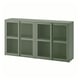 A green IVAR cabinet, rectangular in shape with mesh doors, made of steel, offering closed storage.