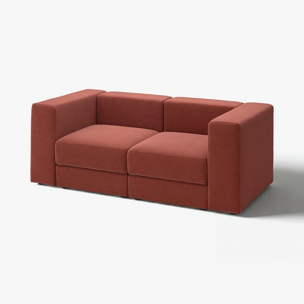 The JÄTTEBO modular sofa in red, with clean lines and deep seats for comfort. The soft, corduroy fabric is easy to clean and move.