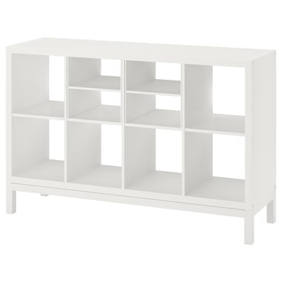 White ikea KALLAX shelving unit with open compartments.
