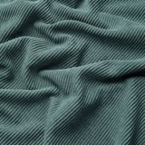 A close-up of KIVIK cover, soft corduroy texture, wavy lines, machine washable.