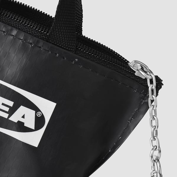 Black keychain bag with zip, branded logo, and metal chain attachment.