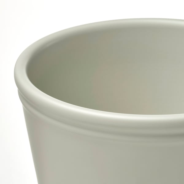 A plain, high-quality light green planter made of durable earthenware, perfect for indoor plants.