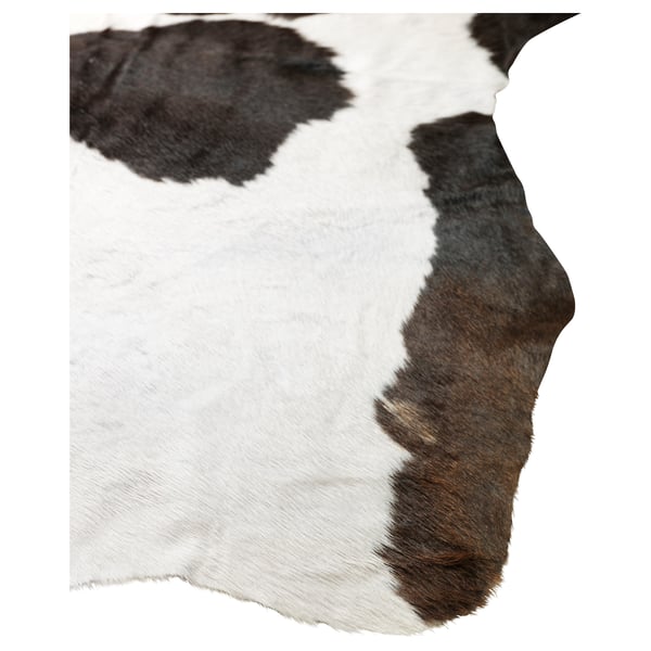 KOLDBY cowhide rug, white with brown patches, durable natural leather, irregular shape, unique design.