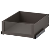 A grey KOMPLEMENT drawer with a glass front, designed for wardrobes, featuring a soft close mechanism.