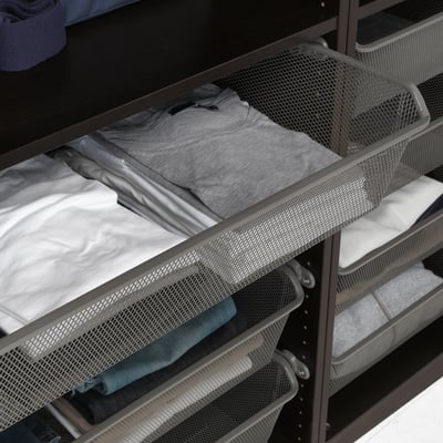 Mesh clothing baskets in drawer unit, showing fresh air circulation and visible, folded clothes.