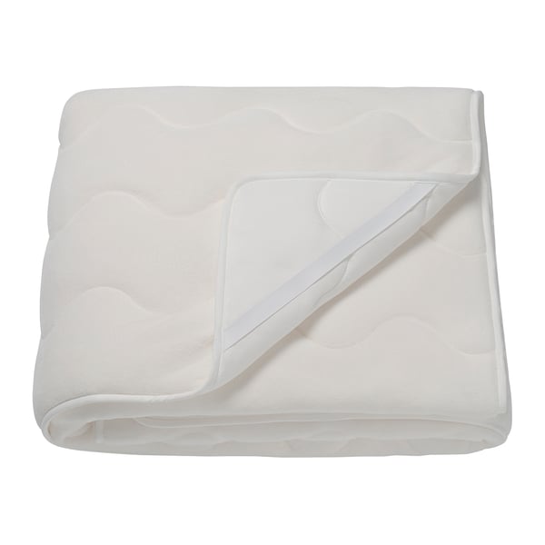 Folded white fleece blanket with soft, plush texture and elastic straps visible.