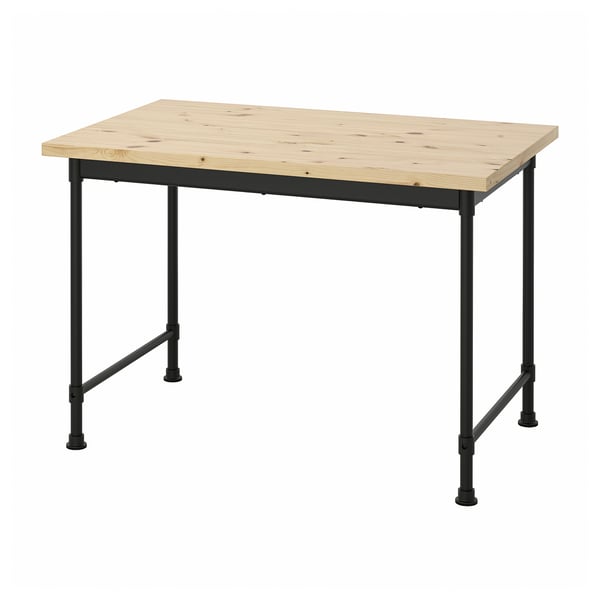 A KULLABERG desk in natural wood and black metal. Its rectangular top has visible knots, resting on sturdy, angled black metal legs.