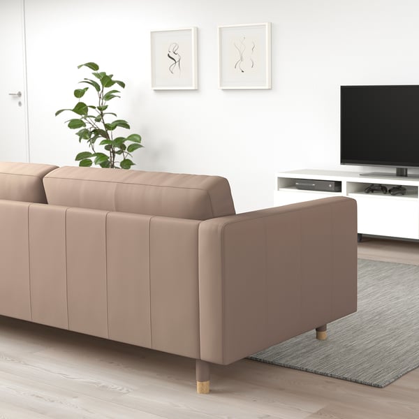 Beige LANDSKRONA sectional in modern living room with tv.