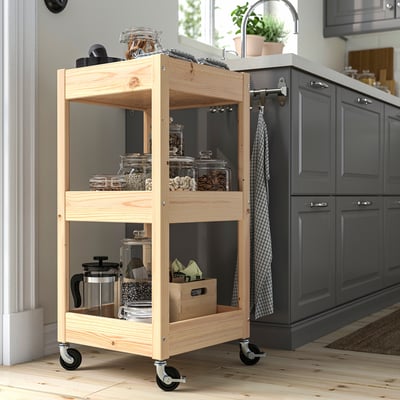 Wooden LOSHULT kitchen trolley, 3-tier, natural. Mobile with locks, corner-fit, warm glow.