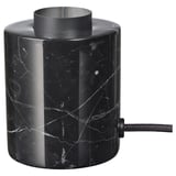 Black marble table lamp base, cylindrical, sleek design with white veining, heavy and stable.