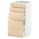 Modern white ikea METOD unit with three light ash wooden drawers, partially open, showcasing organized storage.