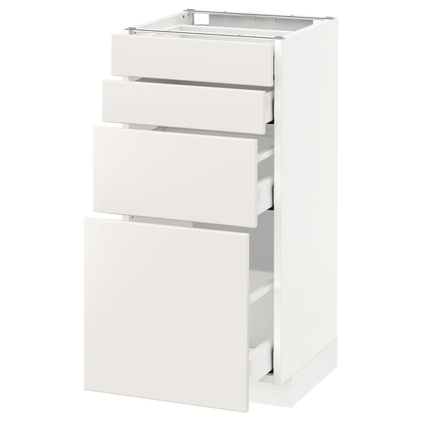White kitchen cabinet with three drawers and one door.