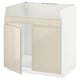The METOD kitchen unit, a modern white cabinet with a glossy beige door, a sleek handle-less design and sturdy construction.