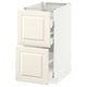 An off-white kitchen cabinet, METOD kitchen system with bodbyn fronts and bevelled edges, featuring smooth-running drawers.