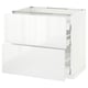 A white METOD kitchen cabinet with two drawers and a glossy finish.