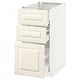 A METOD kitchen cabinet in white with three drawers and one door. It a traditional off-white design with bevelled edges.