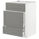 A grey METOD kitchen cabinet with a traditional design and bevelled edges. It a drawer and two shelves.
