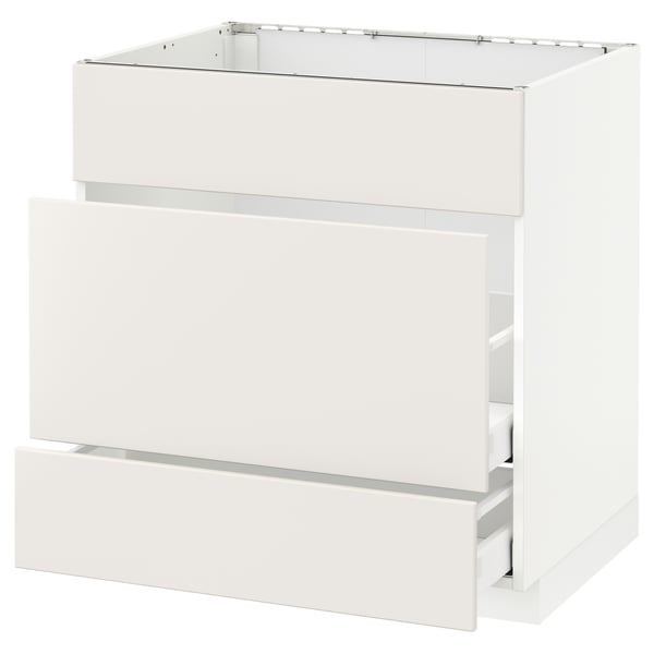 This image shows a white METOD kitchen cabinet from ikea with a sleek design and smooth surfaces. It has one open drawer and is ready for assembly.