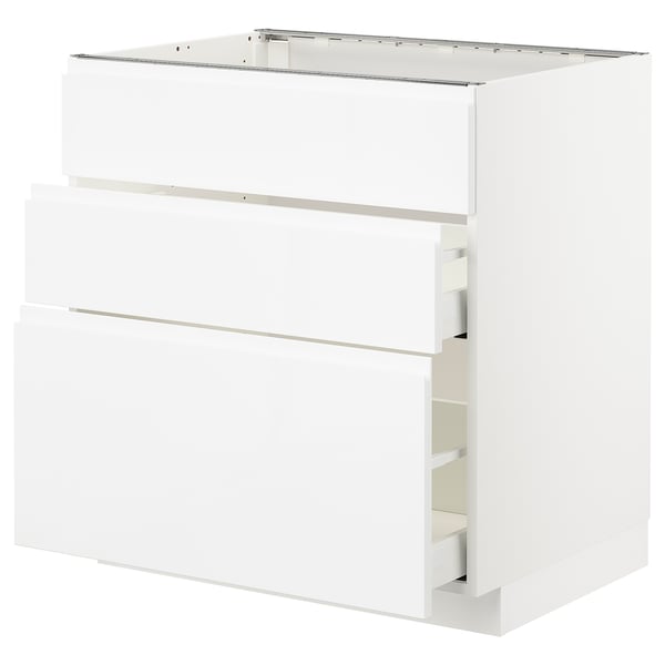 White METOD kitchen cabinet. Modern, glossy finish. Includes full-extension drawers and a sturdy base.