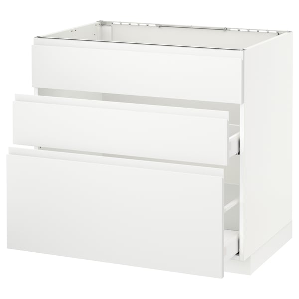 White METOD kitchen cabinet with three drawers and modern minimalist design.