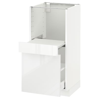 A white glossy METOD kitchen cabinet unit. It a drawer and open storage space, designed for modern kitchens.