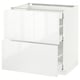 A white METOD kitchen cabinet with two drawers. It has a sleek, modern design with glossy scandinavian style.