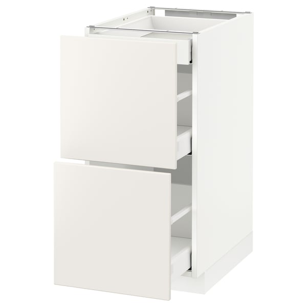 White METOD kitchen cabinet with drawers, sleek design.