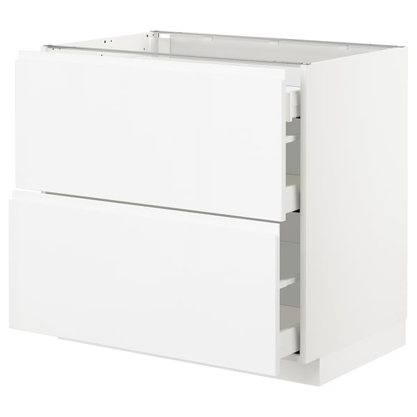 White kitchen cabinet, modern design with two full-extension drawers, sleek surfaces.