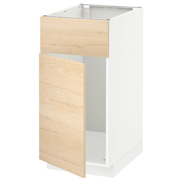 Ikea METOD white cabinet with light ash drawer, sleek modern design.
