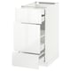 A white METOD kitchen cabinet with three open drawers. The cabinet is sleek and modern with glossy finish drawers.