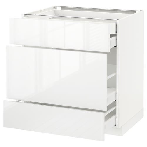 White METOD kitchen unit with glossy finish and sleek drawers.