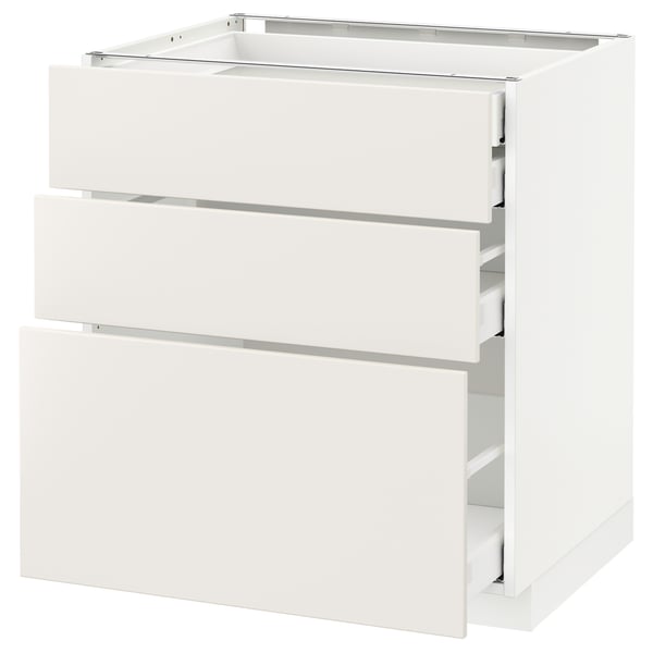 A white METOD kitchen cabinet with smooth, modern design and three full-extension drawers.