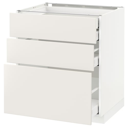 A white METOD kitchen cabinet with smooth, modern design and three full-extension drawers.