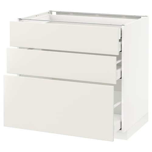 A white METOD kitchen cabinet with three drawers, smooth and modern design.