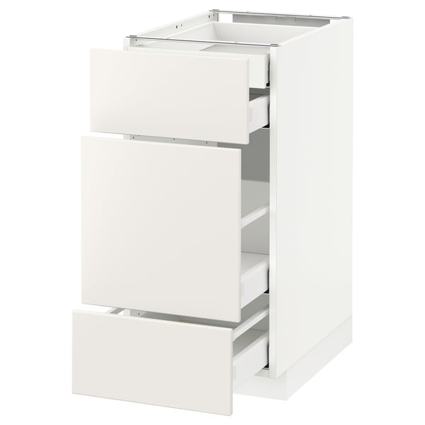 White METOD kitchen unit with three drawers, sleek modern design, smooth edges.