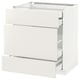 A white METOD kitchen cabinet with smooth drawers. Its rectangular, featuring a modern design with clean lines.