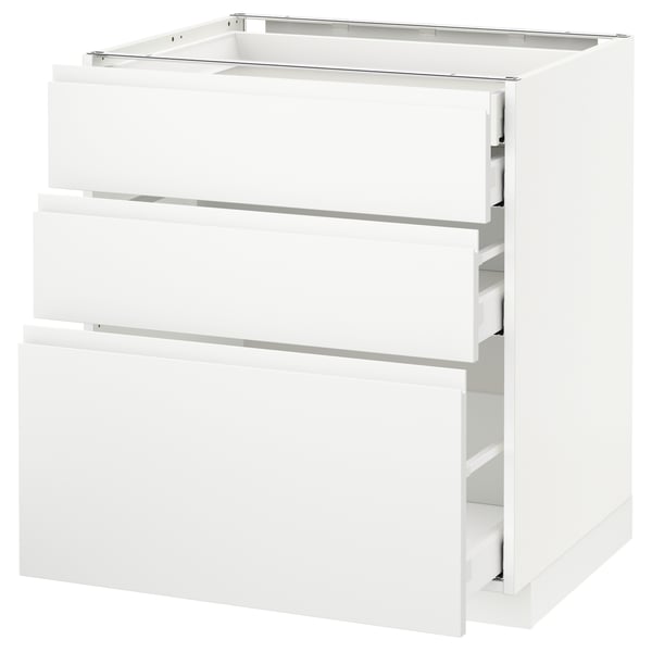 A white METOD kitchen cabinet with three drawers, sleek and modern design with integrated handles.
