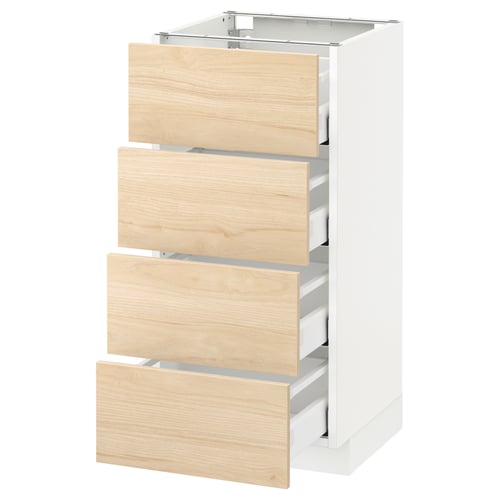 A white METOD kitchen cabinet with light wood drawers, four visible, partially open.
