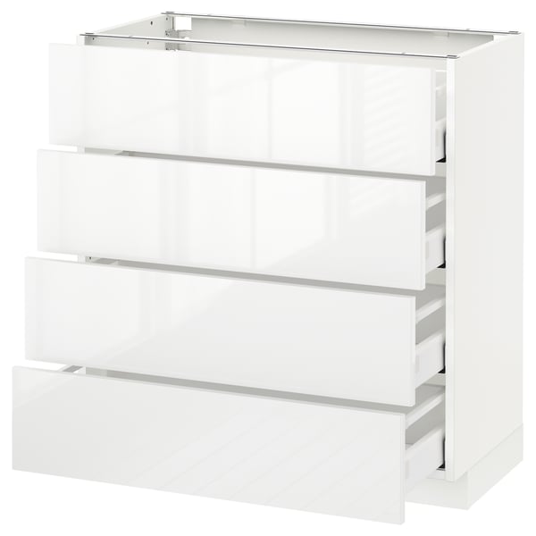 Modern white high-gloss kitchen unit with four drawers.