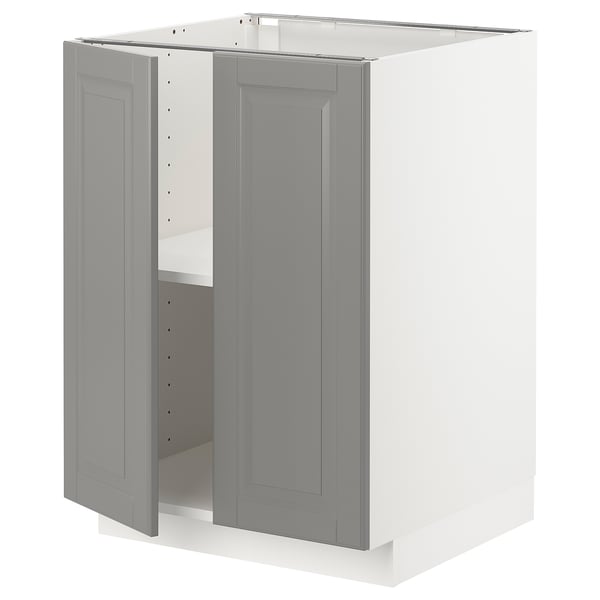 Grey METOD kitchen cabinet with two doors open, showing shelves.